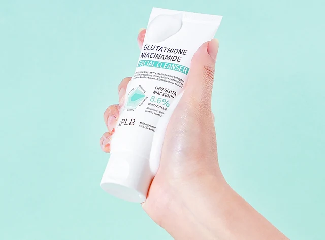 Cleanser tube held in hand