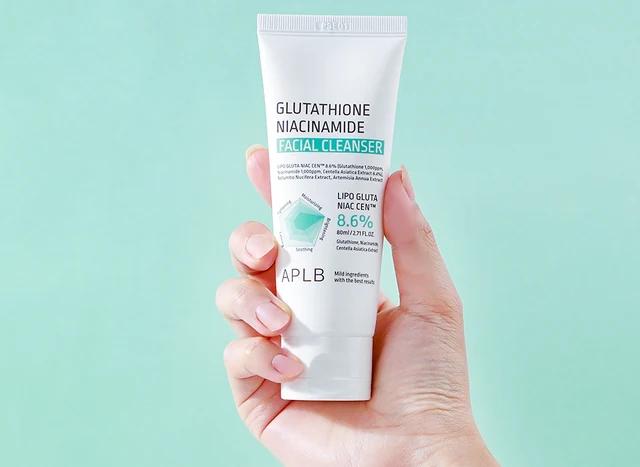 Front of the cleanser tube in hand