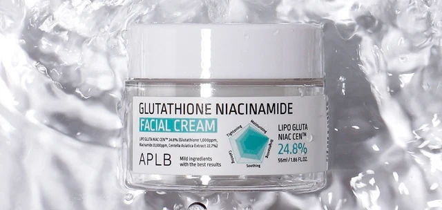 Facial cream jar photographed with water