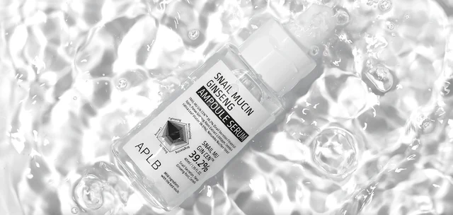 Snail mucin ginseng serum photographed with water